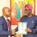 Omosehin Presents license to NPF Insurance Co