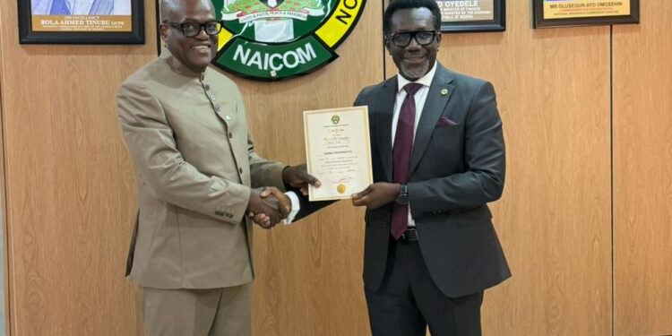 Photo News : Recapitalised. NAICOM Issues Guinea Insurance With New Licence Post Recapitalisation.